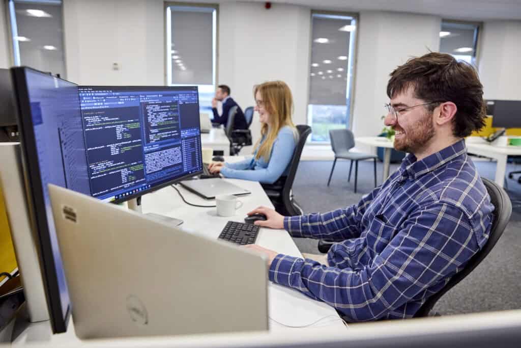 data analysts work at their desks