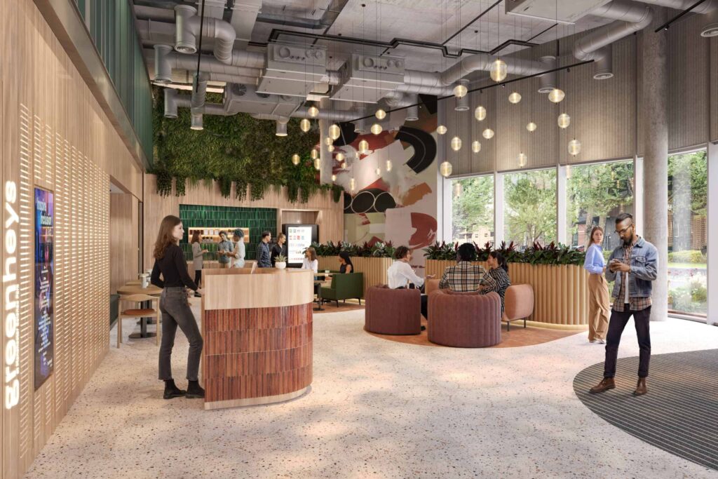 A CGI image of UK Biobank's reception at the new Greenheys building. People are milling around, sitting on chairs and standing up talking